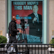 A poster of O’Reilly outside News Corp. in April 2017, shortly before he was, in fact, moved right out of his job.